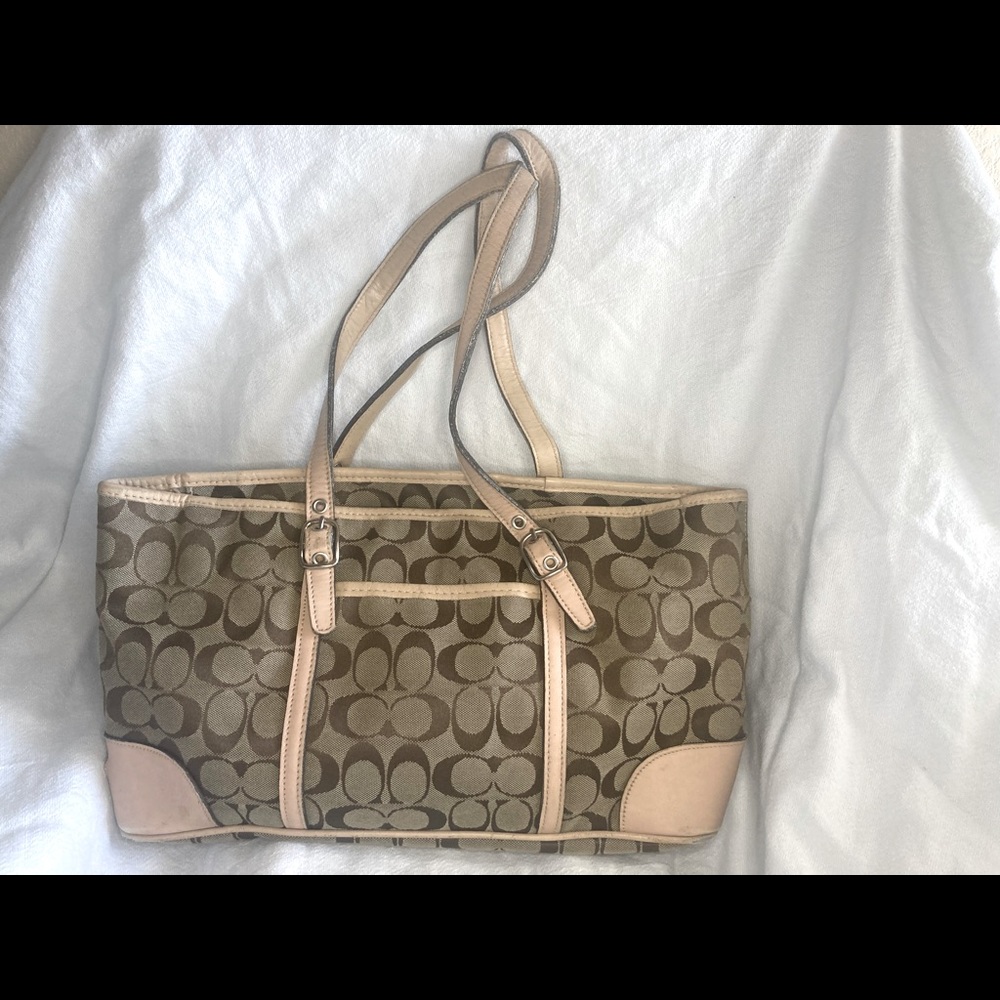 Coach handbag. Needs repair and straps are a bit worn (see photos ).